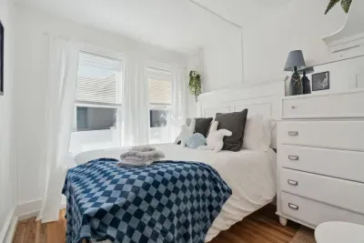Second bedroom comes with refinished floors, large bureau and comfy, full sized, memory foam bed.