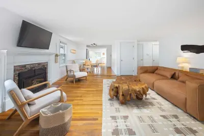 The living room with a smart TV, and new gas fireplace!