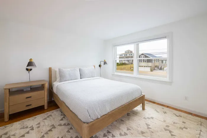 Rest easy in this cozy bedroom with a comfy queen bed. Clean linens provided! 💤✨