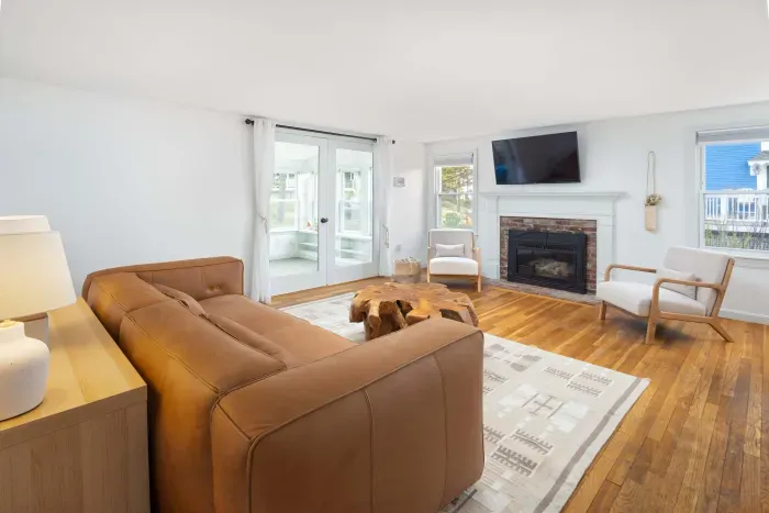The living room with a smart TV, and new gas fireplace!