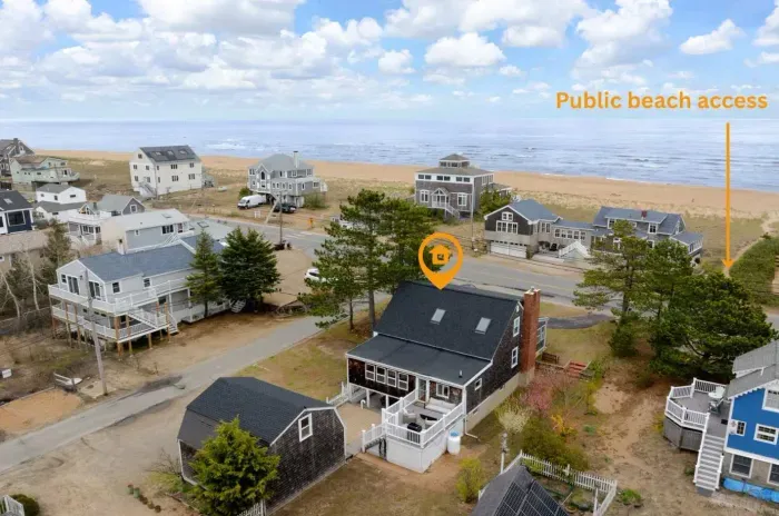 Aerial shot of the home! This home is just steps away from the beach!!