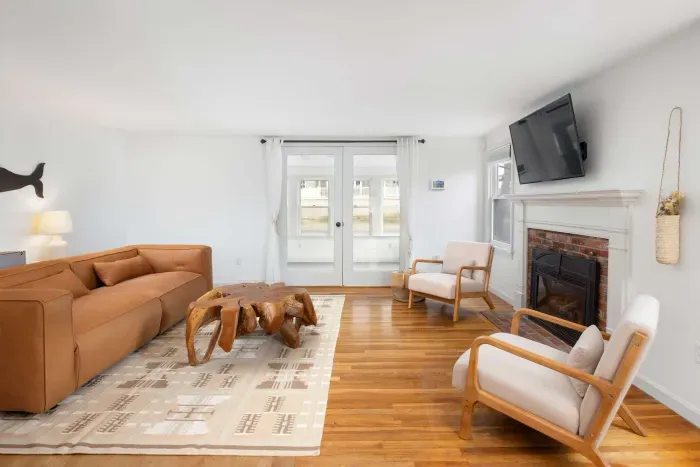 The living room with a smart TV, and new gas fireplace!