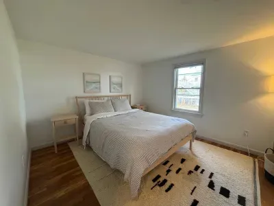 Rest easy in this cozy bedroom with a comfy queen bed. Clean linens provided! 💤✨