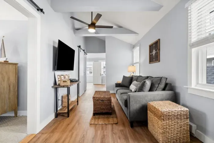 Living room with couch (not a sleeper sofa) and smart Roku TV to enjoy your streaming services and basic cable.
