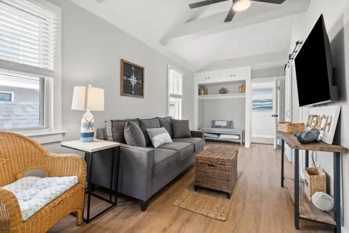 Living room with couch (not a sleeper sofa) and smart Roku TV to enjoy your streaming services and basic cable.