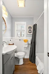 Full bathroom with shower tub.
