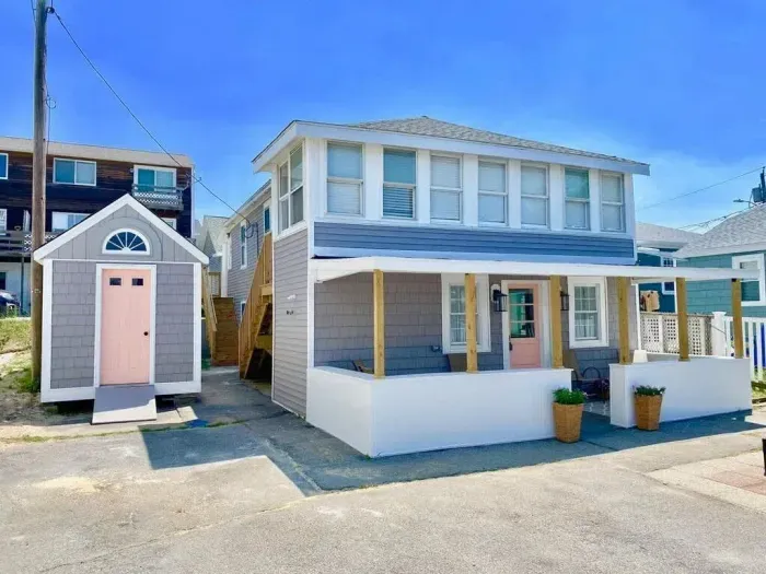 View of property from Railroad Ave. 69 Railroad Ave is the second level unit, accessed by the stairs on the left side.