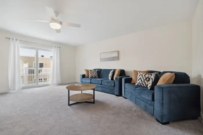 Spacious secondary living area on the second floor, perfect for relaxation and entertainment.