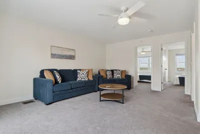 Spacious secondary living area on the second floor, perfect for relaxation and entertainment.