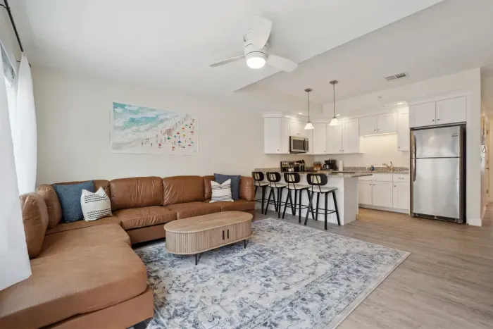 Roomy living room adjacent to the kitchen, complete with a Roku TV.