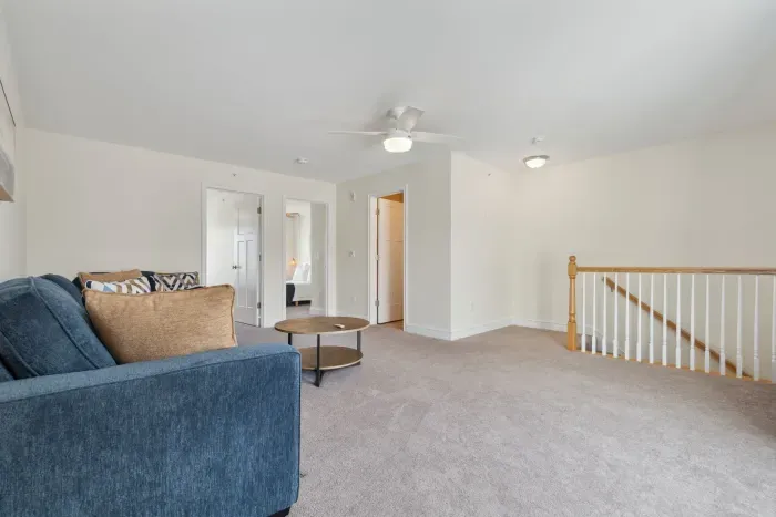 Spacious secondary living area on the second floor, perfect for relaxation and entertainment.