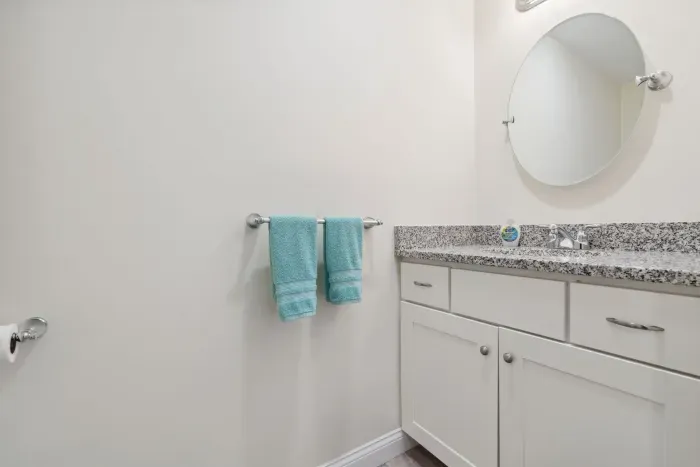 Half bathroom between kitchen and master bedroom