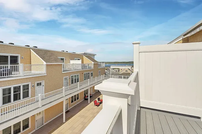 Relax and watch the sunset on our expansive balcony.