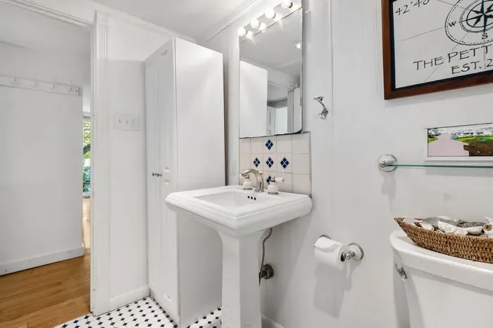 The full bathroom is located in the hallway off the kitchen. There is a shower and tub combo. Clean towels provided for all guests