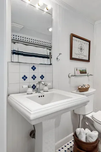 The full bathroom is located in the hallway off the kitchen. There is a shower and tub combo. Clean towels provided for all guests