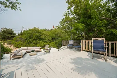 Looking to grill and have an outdoor meal? There's plenty of dining areas out on the deck!