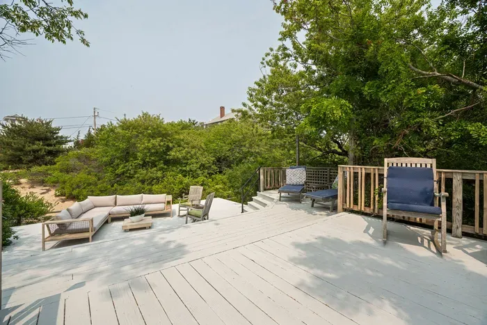 Looking to grill and have an outdoor meal? There's plenty of dining areas out on the deck!