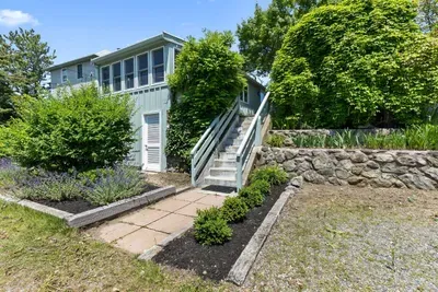 The main entry to the home has about 12 steps up to the home. Please be prepared as these steps are relatively steep. There is another driveway on the right where there are only 2 steps. Parking for 4 vehicles in the driveway