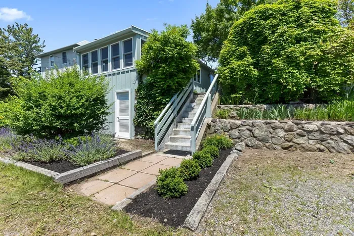 The main entry to the home has about 12 steps up to the home. Please be prepared as these steps are relatively steep. There is another driveway on the right where there are only 2 steps. Parking for 4 vehicles in the driveway