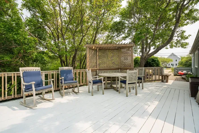 Looking to grill and have an outdoor meal? There's plenty of dining areas out on the deck!