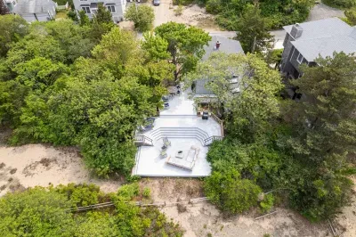 This home has a massive deck area with plenty of room for everyone to escape the sand after a day at the beach