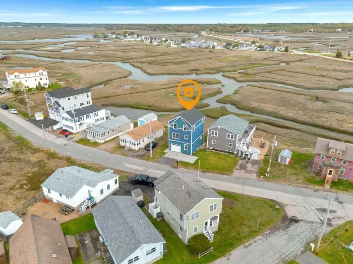 This home is located just minutes to the beach with incredible views of the Hampton Marsh!