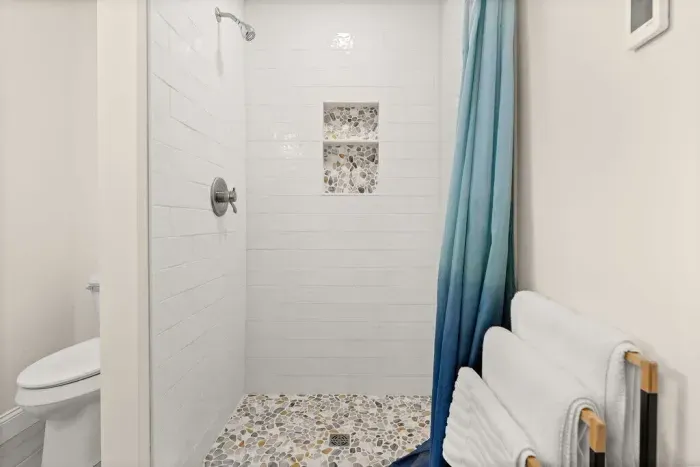 Master bedroom ensuite with heated floors and tiled shower! Clean towels provided