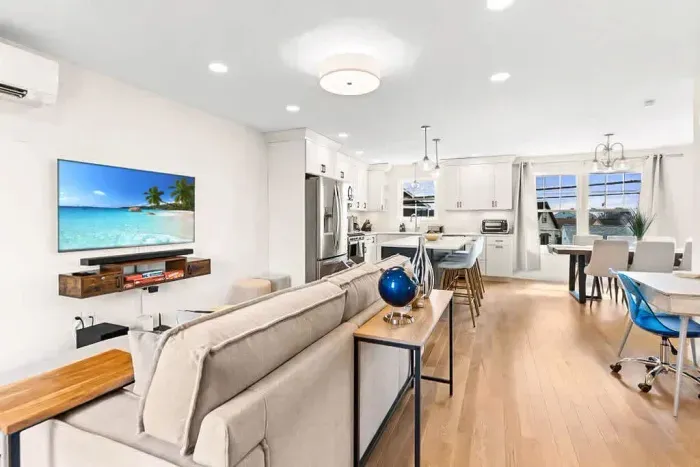 Open Kitchen, living room and dining room with high-end finishes/appliances and gas fireplace