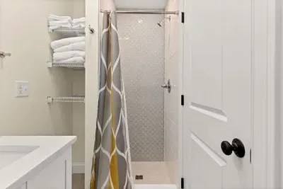 Bathroom #3 with standup tiled shower. Clean towels provided!