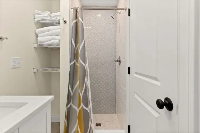 Bathroom #3 with standup tiled shower. Clean towels provided!