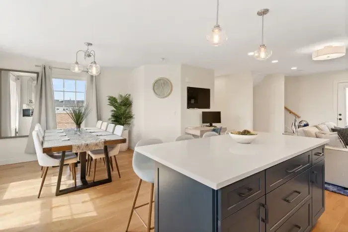 Open Kitchen, living room and dining room with high-end finishes/appliances and gas fireplace