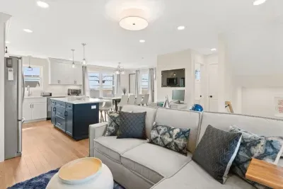Open Kitchen, living room and dining room with high-end finishes/appliances and gas fireplace