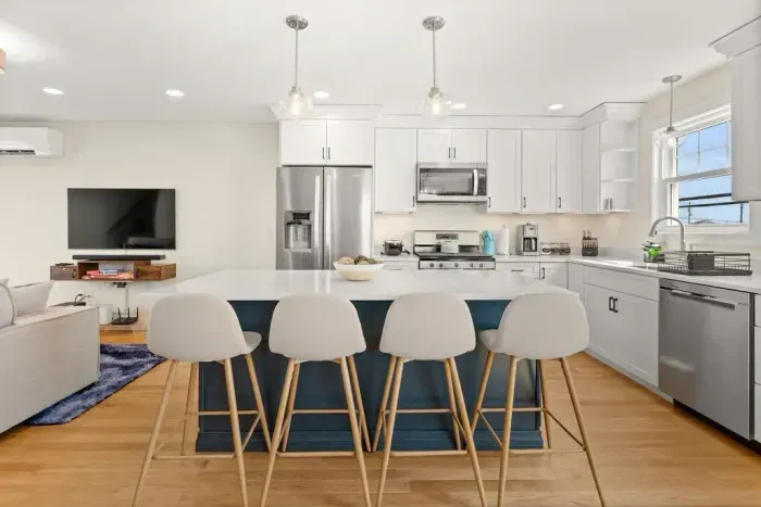 Open Kitchen, living room and dining room with high-end finishes/appliances and gas fireplace