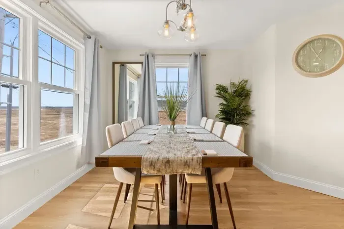 The dining table is perfectly situated over looking the Hampton marsh! Spend time with family in this beautiful spot.