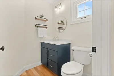 Half bathroom off the kitchen/living room