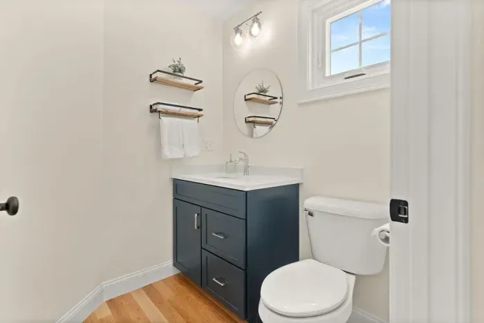 Half bathroom off the kitchen/living room