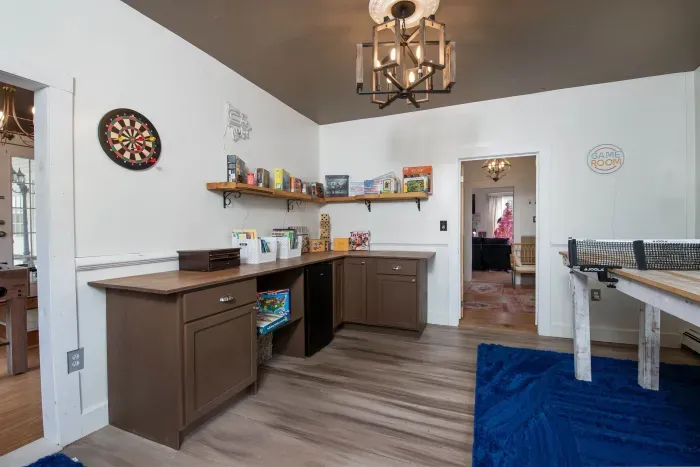 The Game Room, with ping pong, lots of games, another Roku TV and foosball in the adjacent room.