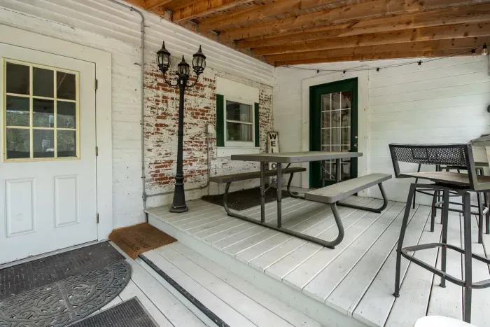 The side porch with the main access to the home