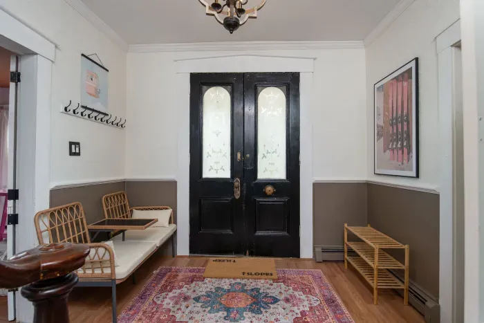 This grand front entrance leads out to the front porch