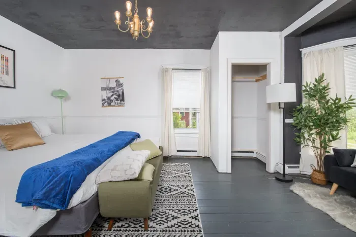 1st King bedroom with provided bedding, extra blankets and towels