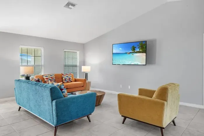 Open living room and kitchen with 65 inch flat screen smart TV, stong WiFi and fully-equipped kitchen with all major appliances.