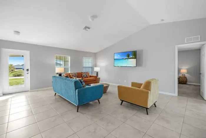 Open living room and kitchen with 65 inch flat screen smart TV, stong WiFi and fully-equipped kitchen with all major appliances.