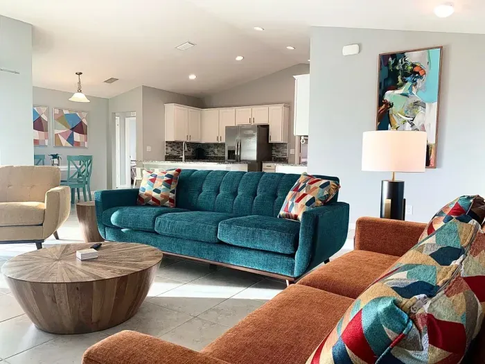 Open living room and kitchen with 65 inch flat screen smart TV, stong WiFi and fully-equipped kitchen with all major appliances.