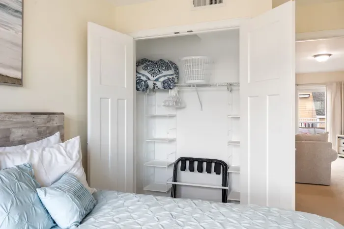 Bedroom #2 upstairs with luggage racks