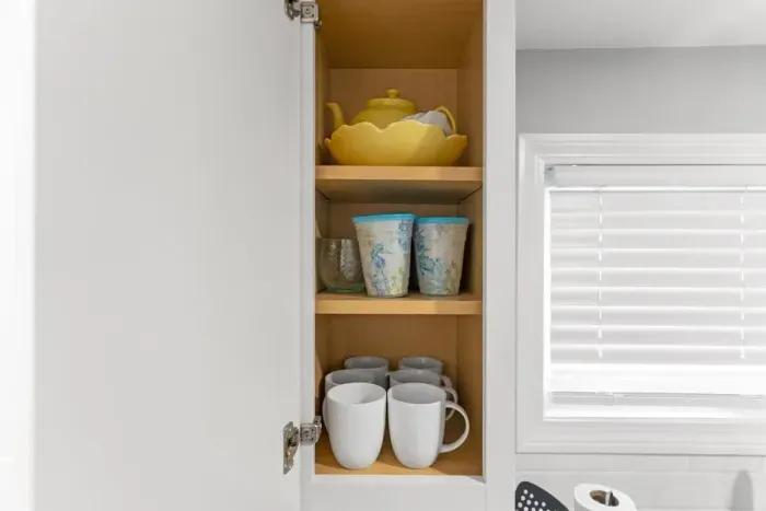 Kitchen is fully stocked with all the essentials! including cups, utensils, and plates