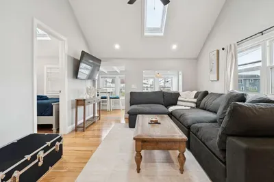 Living room with vaulted ceilings