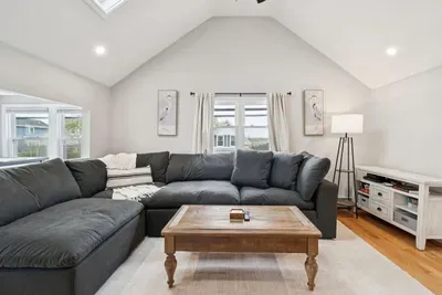 Living room with vaulted ceilings