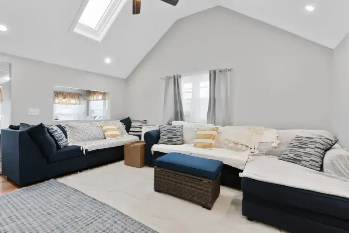 Living room with vaulted ceilings