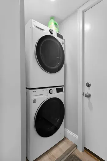 Stacked washer/dryer in bathroom
