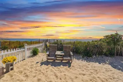 Fenced-in, communal, beach area for the condo building